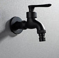 Black wall-mounted faucet on a light gray background
