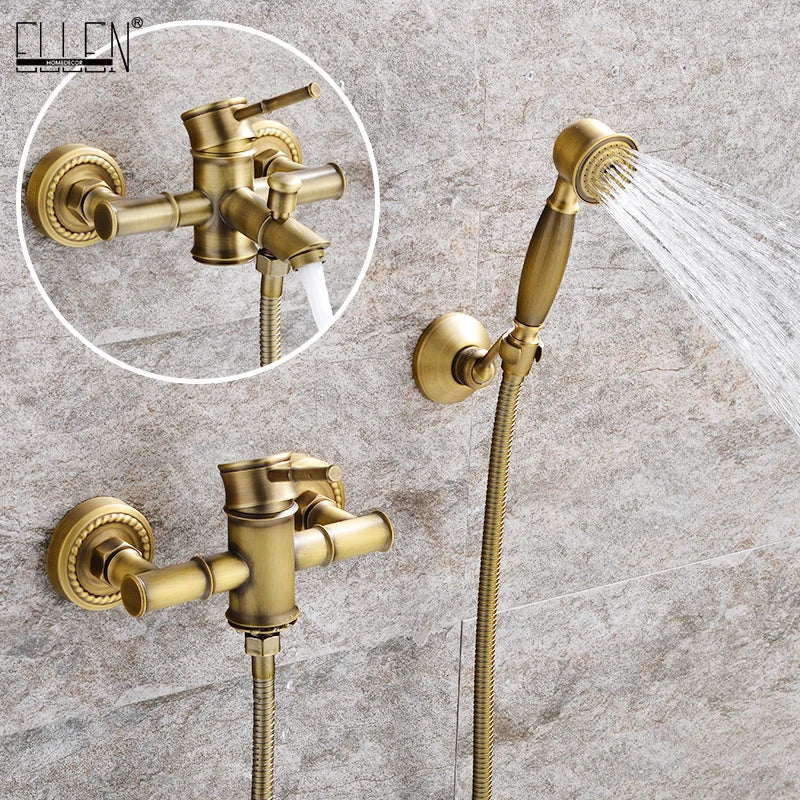 Gold shower system with handheld shower head and control valves on a stone wall background.