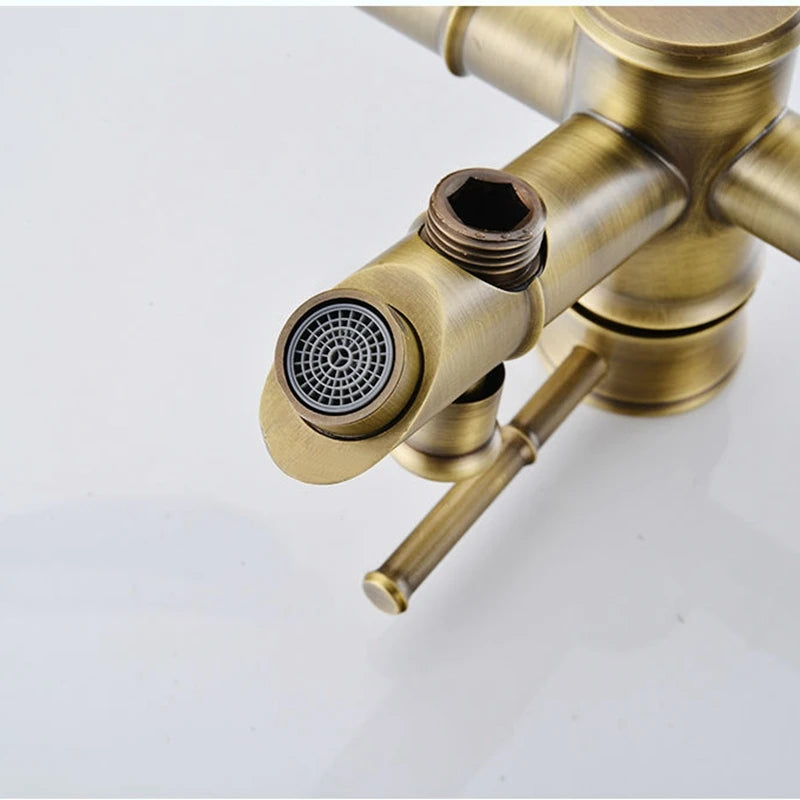 Brass faucet on a white background