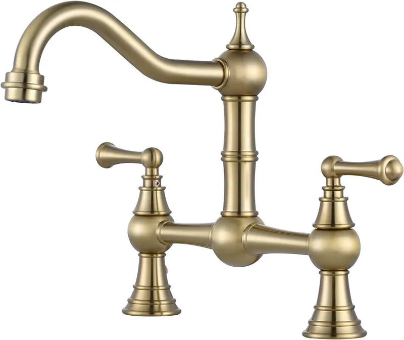 Gold kitchen faucet on a white background