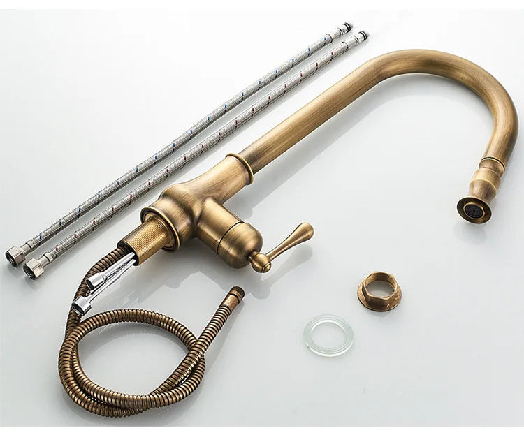 Vintage-style brass faucet set on a white background