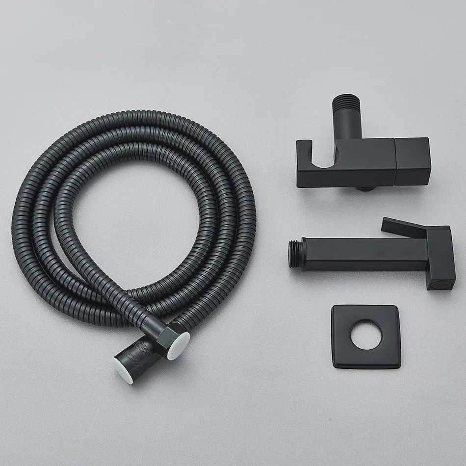 Black shower head and hose set on a gray background