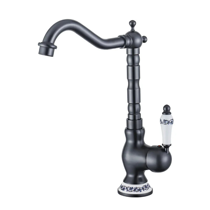 Black kitchen faucet with decorative spout on a white background