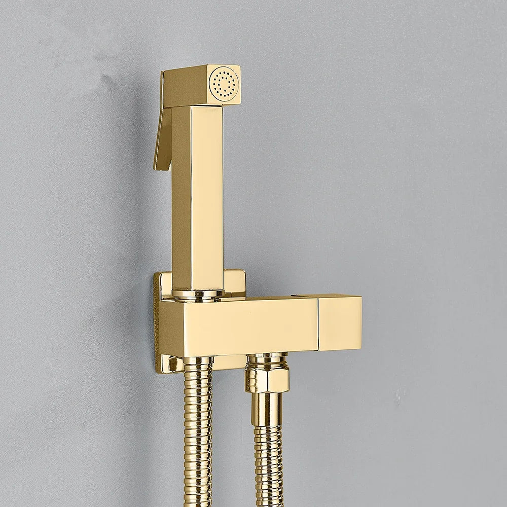 Gold-colored shower head with flexible hose on a grey background