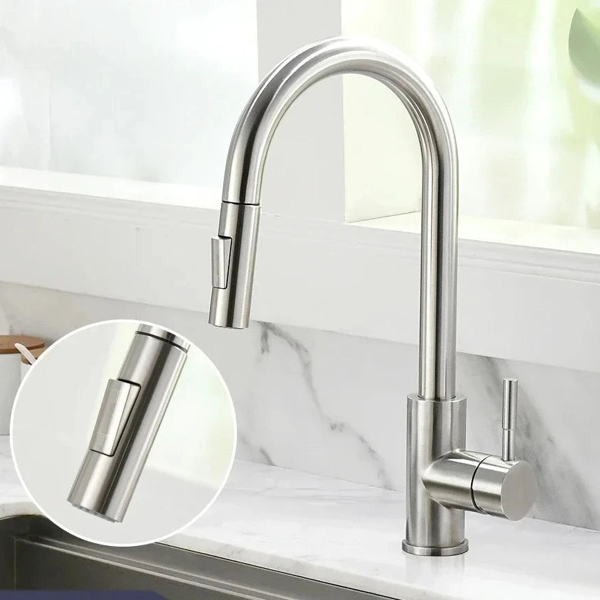 A brushed nickel pull-down kitchen faucet installed on a white marble countertop. The image includes a circular inset showing a close-up of the faucet's pull handle and text at the bottom reading '866005SN' and 'Brushed Nickel'.