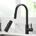 A matte black gooseneck kitchen faucet with a pull-out spout and single handle, shown installed on a white marble sink. A circular inset highlights the pull-out head.
