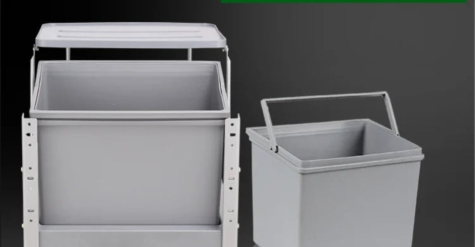 Two gray plastic waste bins with white metal frames, one larger and one smaller, shown against a dark gray gradient background.