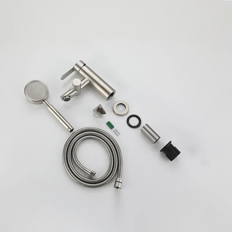 Collection of bathroom faucet parts on a white background